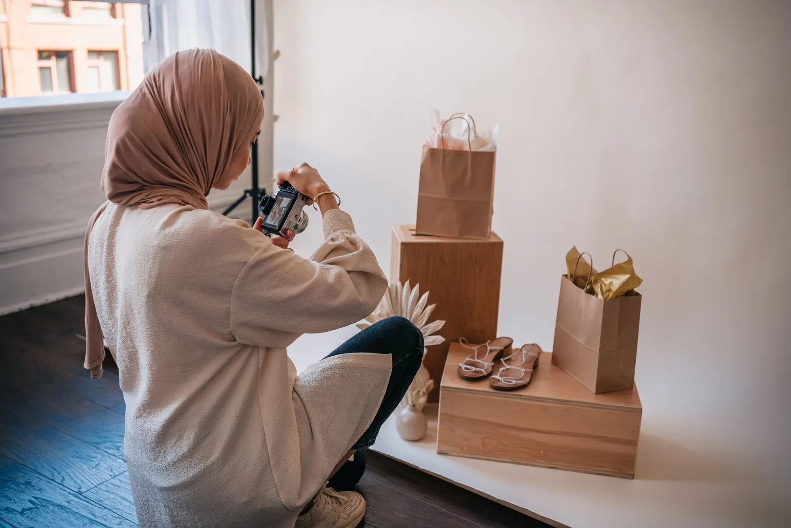 Creative professional photographing products in a studio